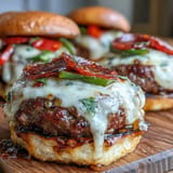 Juicy, sizzling Hot Honey Pizza Burgers loaded with toppings, ready to devour.