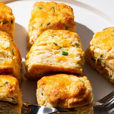 Warm, flaky Avocado Cheddar Breakfast Biscuits: soft avocado melts into sharp cheddar.