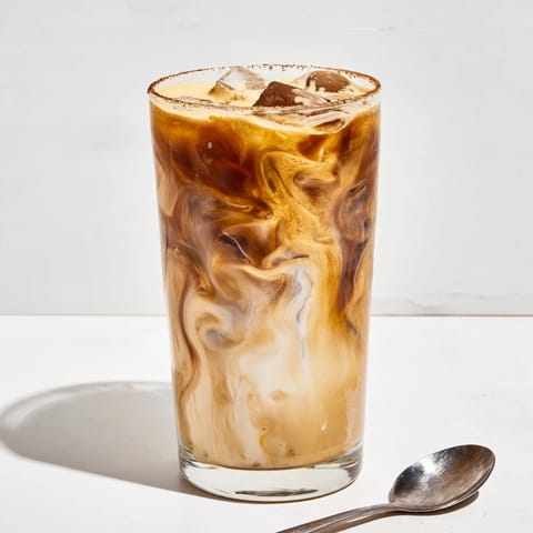 Indulge in a rich Tahini Iced Coffee blending nutty tahini and cold brew.  