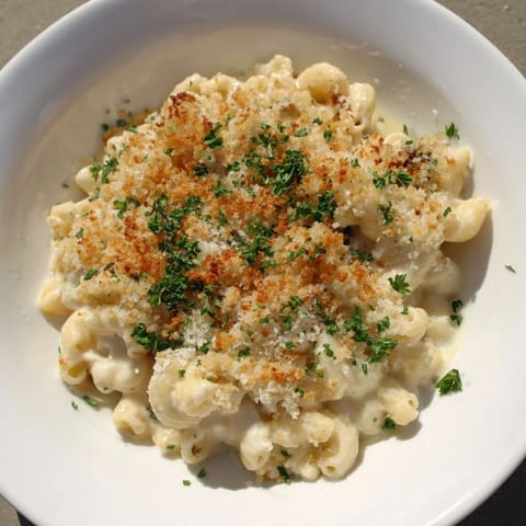 This decadent Truffle Macaroni & Cheese features a rich cheese sauce and crispy breadcrumb topping.