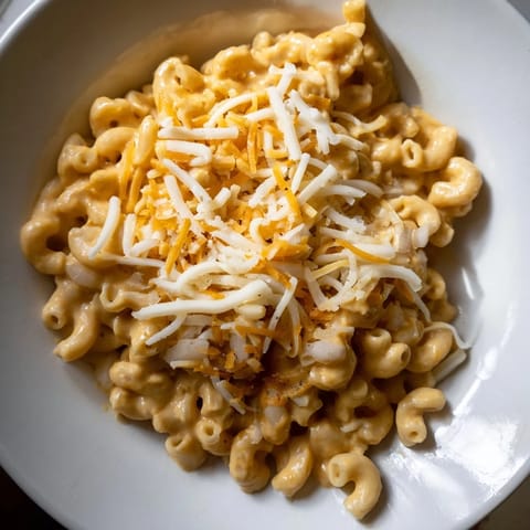 Golden, cheesy One-Pot Butternut Squash Mac & Cheese, with tender pasta and vibrant butternut squash.