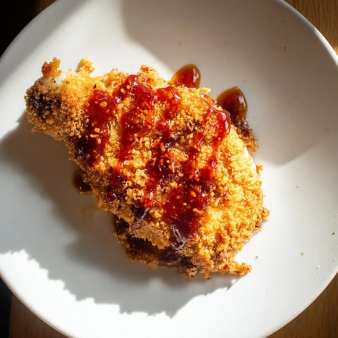 Perfectly golden brown and juicy, these Hot Honey Crispy Chicken Thighs are an easy main dish.