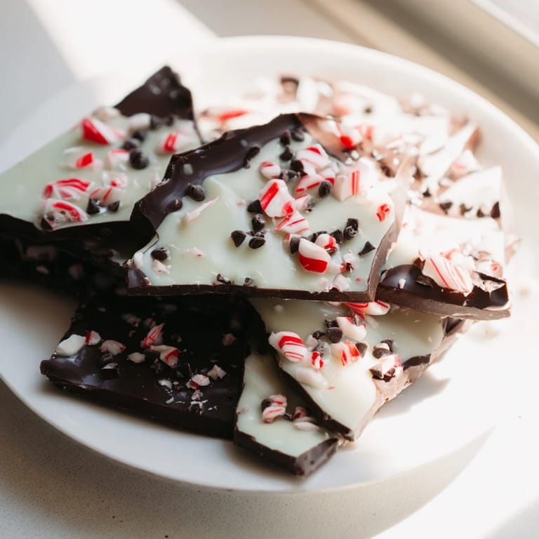 Shareable Peppermint Bark shards, featuring sweet white chocolate layered over rich dark chocolate, ready to enjoy.